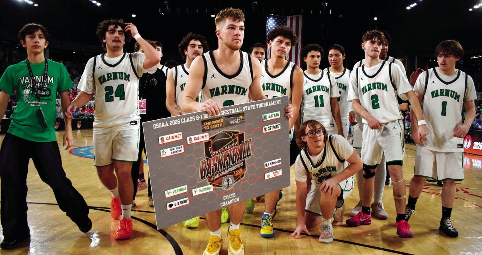 The Varnum Whippet basketball team displays a state championship bracket after defeating Glencoe in the Class B-1 boys quarterfinals Thursday in Oklahoma City. The Whippets advanced to the semifinals, where they were due to face Calumet Friday evening. Th