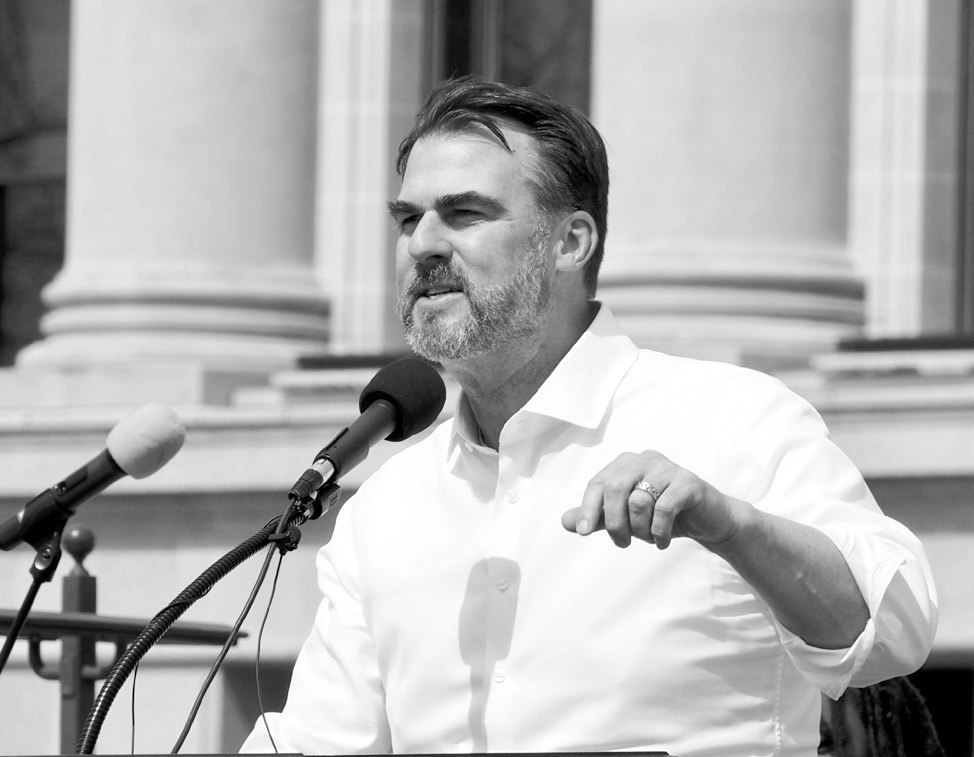 Gov. Kevin Stitt, pictured March 12 speaking at a rally outside the state Capitol, named an interim commissioner for the Oklahoma mental health department Tuesday. (Photo by Emma Murphy/Oklahoma Voice)