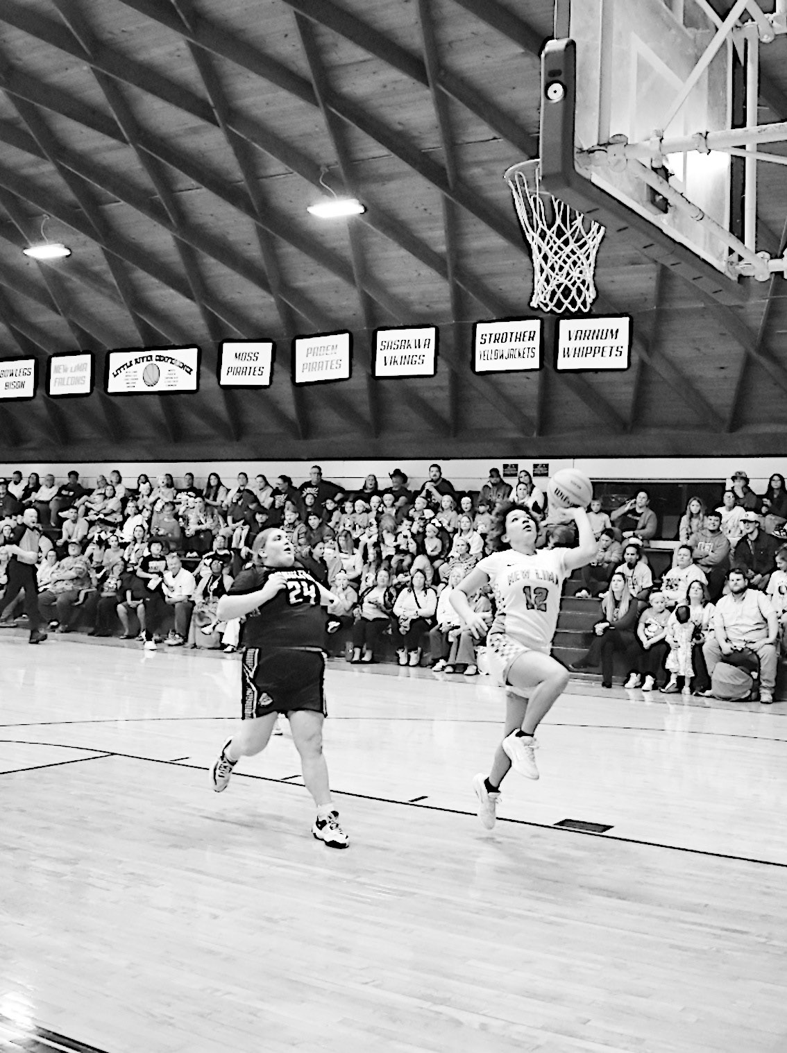 New Lima Falconette Jaidyn Hinton flies in for the layup Thursday night. Staff Photo by Andy Wilson