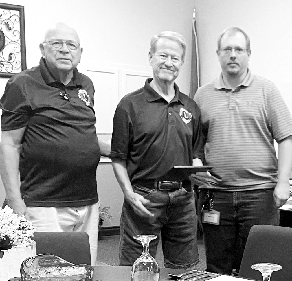 Longtime Seminole Lions Club member and former Seminole State College instructor Fred Buynan (center) was named “Lion of the Year” at this week’s club meeting. Presenting him with the honor was Les Walker (left) and Club President Mark Lewin. (Photo