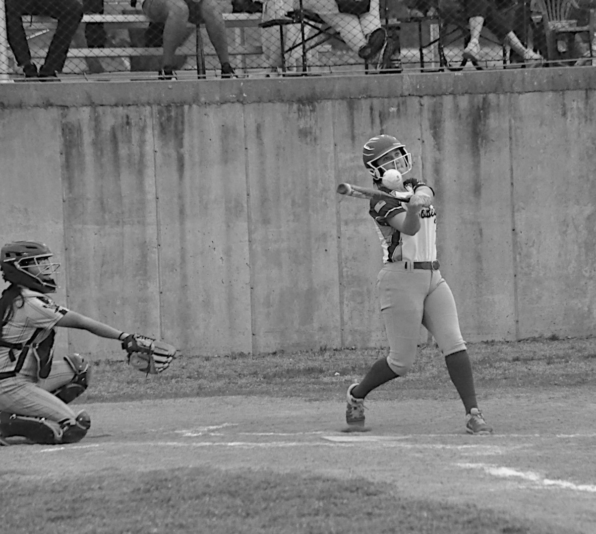 Bowlegs Lady Bison Cira Parsons knocks one to the outfield to get on base. Staff Photo by Bill Anderson