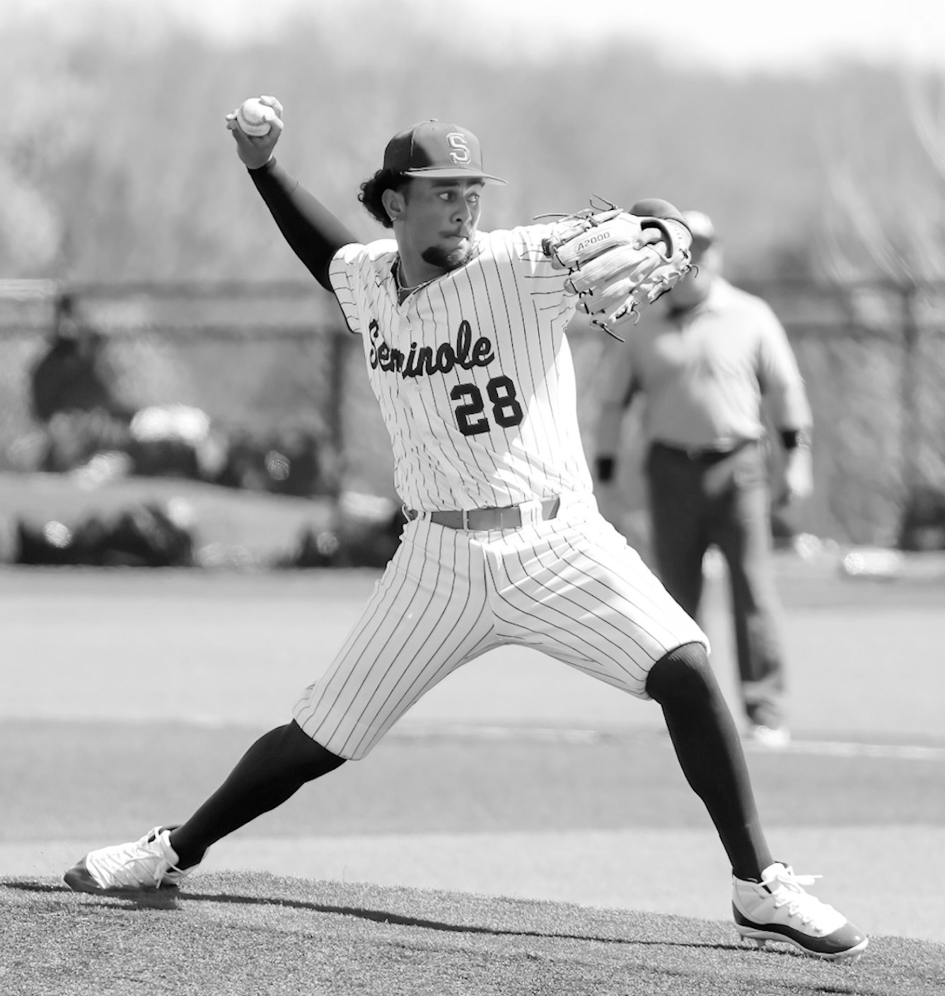Seminole State Pitcher Jaxon Ramos delivers a pitch in a relief roll for the Trojans. Courtesy Photo by Glen Bryan