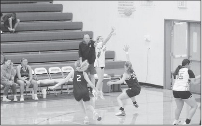 Courtesy Photo by Jeanne Gosa Varnum Lady Whippet Kenzlee Houck shoots the 3-point jumper against Regent Prep Thursday.