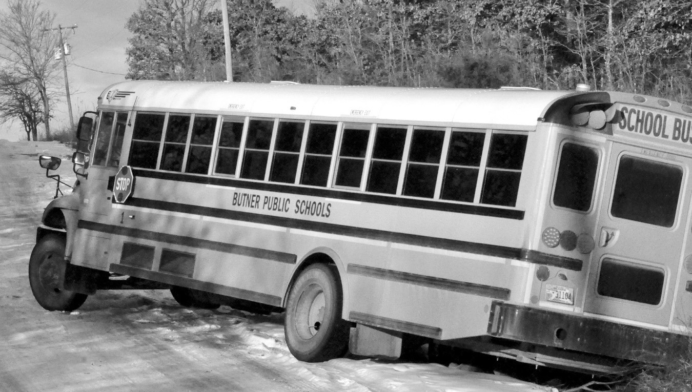 A Butner school bus became stuck on a snow-packed EW116 as it attempted to navigate the hill ahead of it early Tuesday morning. All passengers were unloaded and put on another bus and taken safely to school. No injuries were reported. The road was still s