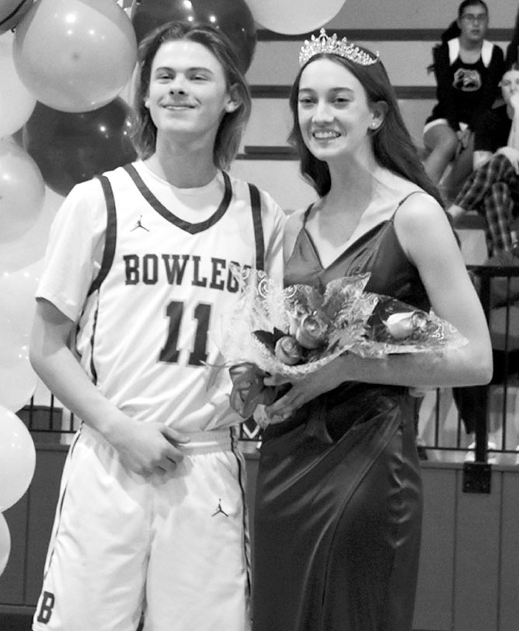 —Staff photo by Andy Wilson Grace Dunagan (right), escorted by Jacob Lewis, was crowned the 2025 Bowlegs Basketball Homecoming Queen Friday night. Both the girl’s and boy’s teams posted wins over Schulter, making the night even more memorable.