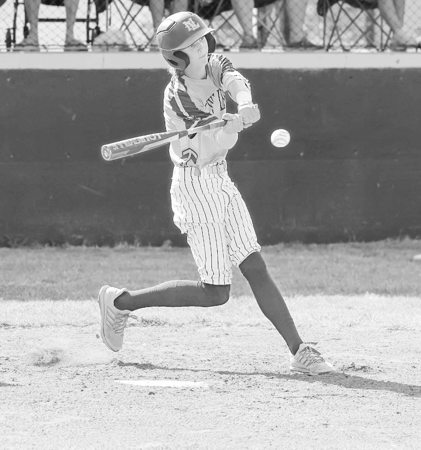New Lima Falcon Tanner Johnson has his eye on the ball as he takes a swing. Courtesy Photo by Glen Bryan