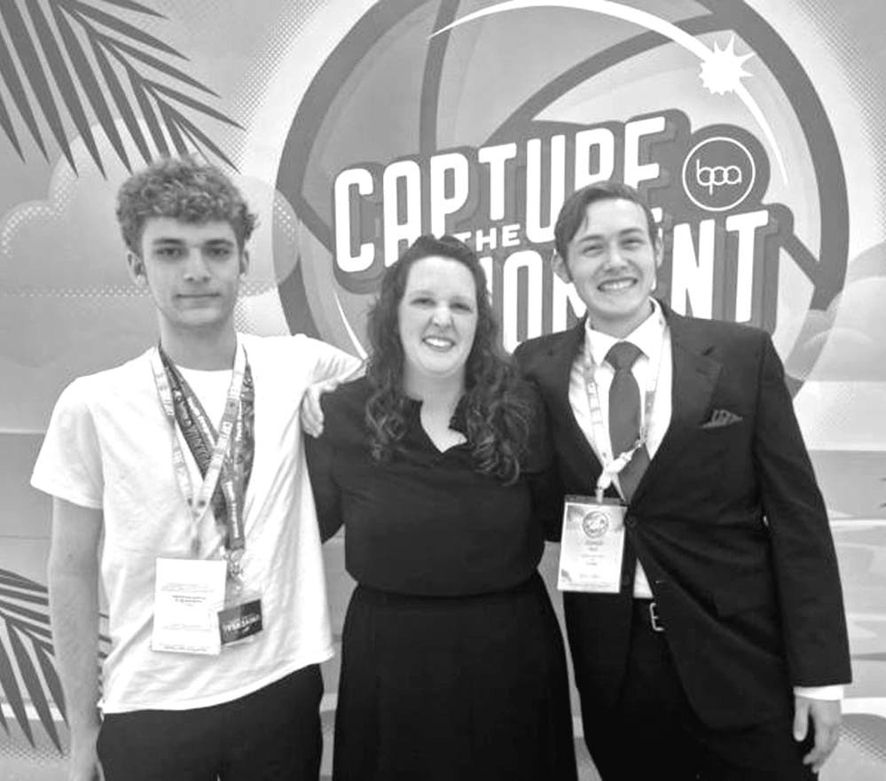 Seminole High School students Brody Foutz (left) and Joseph Mull, both members of the BPA chapter, attended the National Leadership Conference in Florida last week. Pictured with the students is Seminole BPA Advisor Briana Wymore. (Courtesy photo)