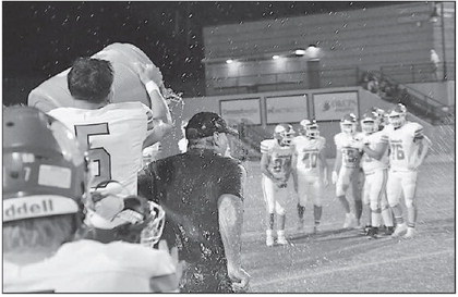 Seminole Chieftain Head Coach Mike Synder gets a Gatorade bath after the 46-12 win over the Knights and earning his 400™ win of his football coaching career. Staff Photo by Bill Anderson