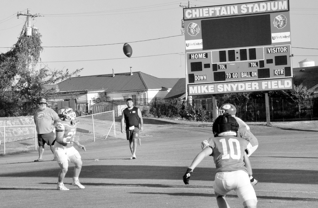 It’s hard to believe that football season is upon us, especially since we’ve been experiencing days where the temperature is above 100 degrees. Despite the heat, the Seminole Chieftains held their annual Green and White scrimmage game Friday night. The action continues with a scrimmage against Morris this Friday, Aug. 21 and the season officially opens Aug. 28 at N.W. Classen. Kickoff is slated for 7 p.m. —Staff Photo by Bill Anderson