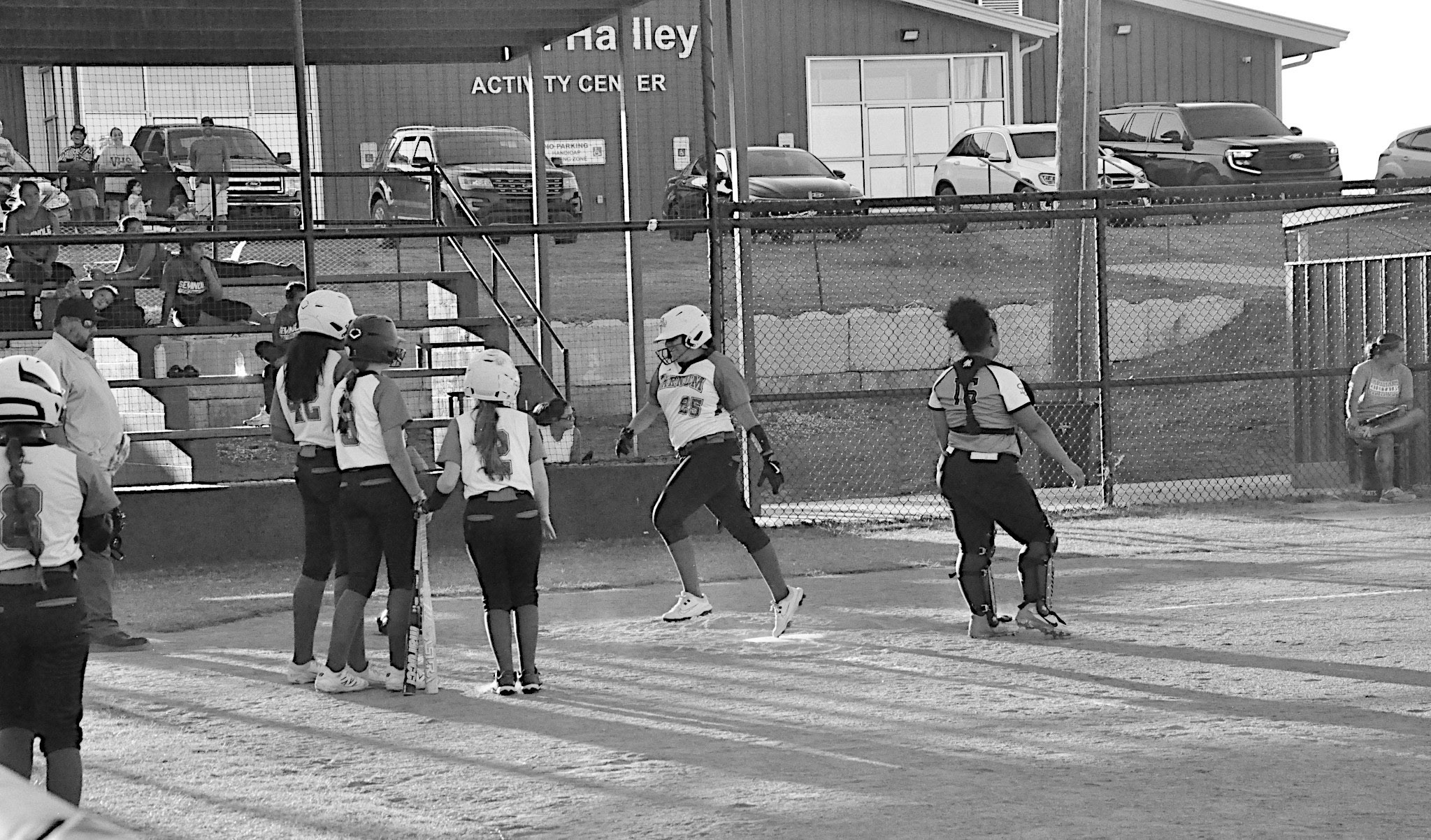 Varnum Lady Whippet Miley Wildcat hits an inside homerun Tuesday evening. Staff Photo by Bill Anderson