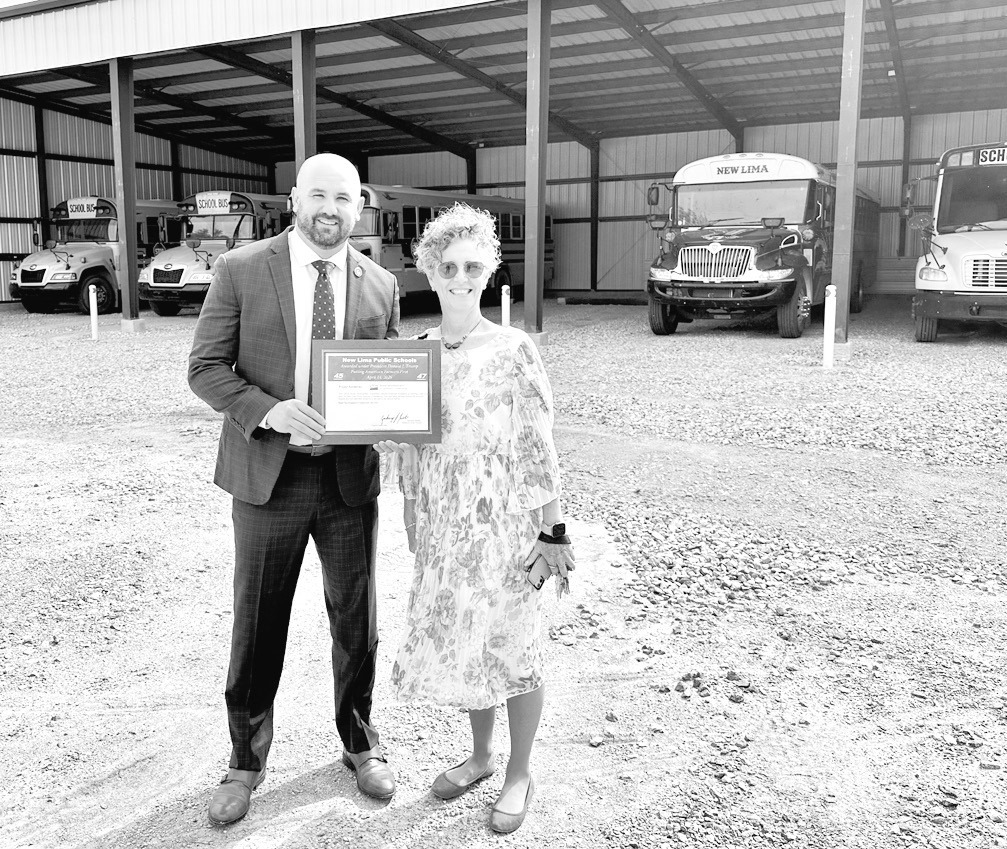 U.S. Department of Agriculture Rural Development Oklahoma State Director Zachary Swartz presents a $50,000 grant award to Rhonda Barkhimer, Superintendent of New Lima Public Schools. The grant, part of a $4.2 million investment in rural Southeast Oklahoma