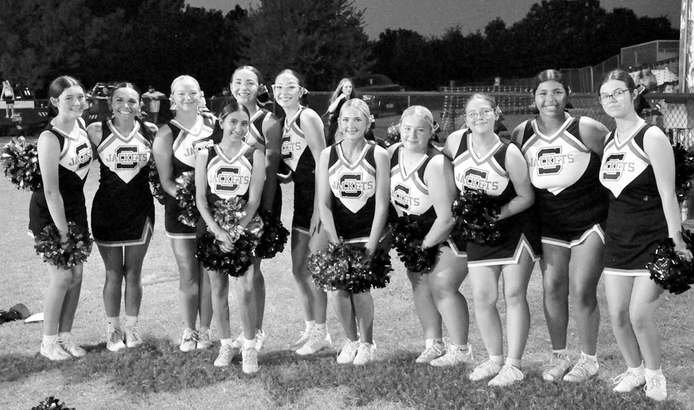 The Strother Yellowjackets cheer squad poses for a group photo during Friday’s game against Midway. Pictured l-r: Wanda Vass, Brooklyn Turner, Emilie Echelle, Karina Lopez, Olivia Speers, Paige Atkeson, Halle Quisenberry, McKenzie Teague, Bailee Busbee,