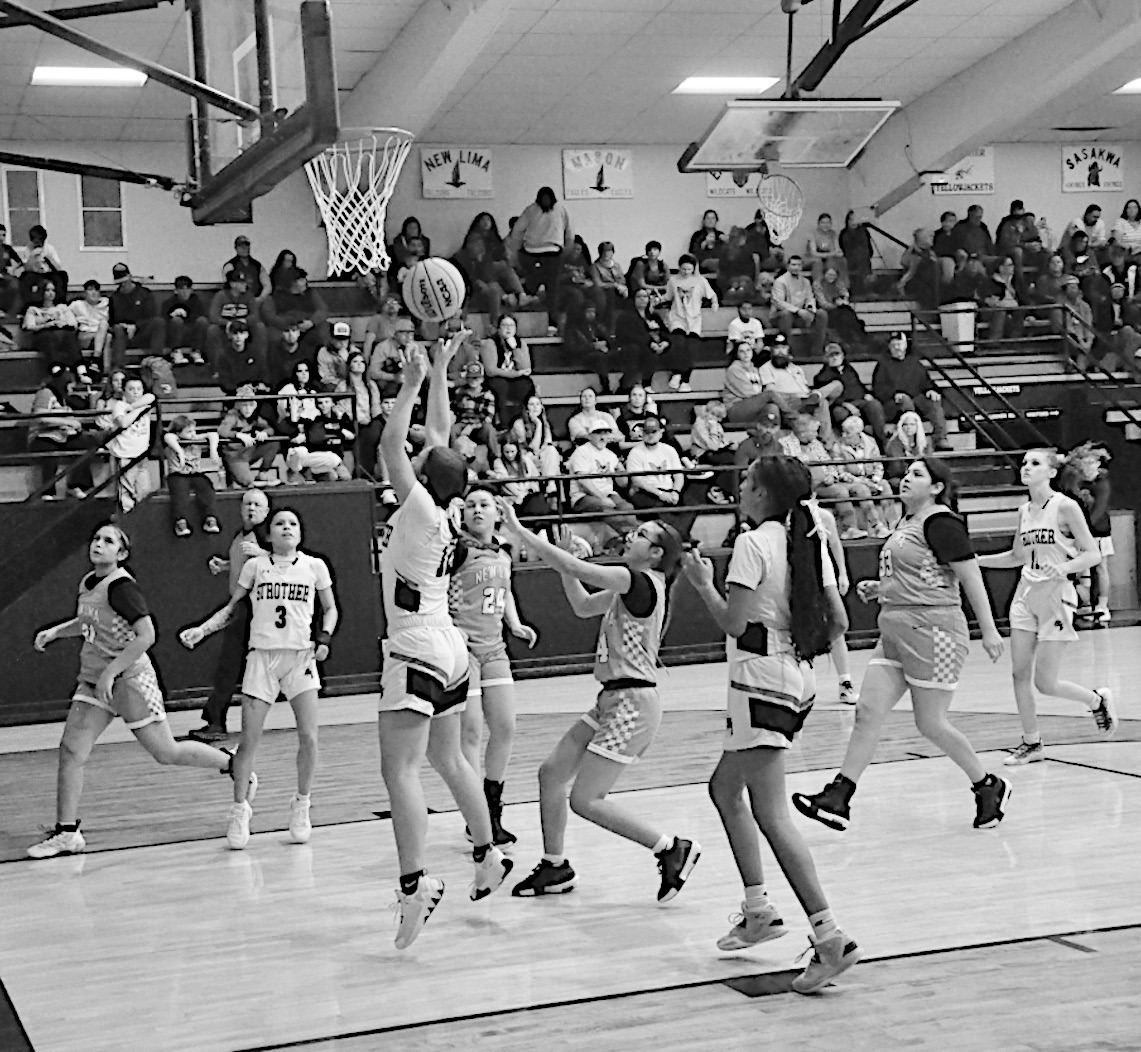 Strother Lady Yellowjacket Olivia Spears goes up for the layup Monday night against New Lima. Staff Photo by Bill Anderson