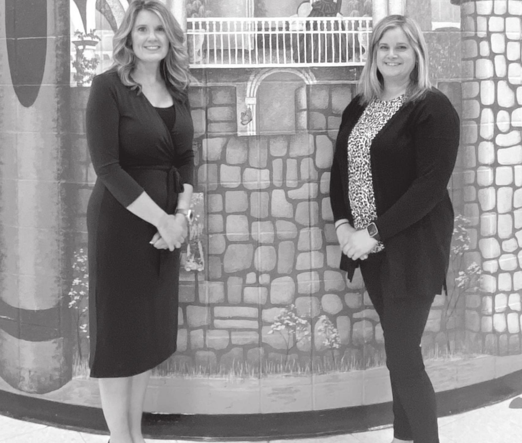 Passing the Baton of Love from Mrs. Willmett, Principal of Betty L. Smith Early Childhood Center