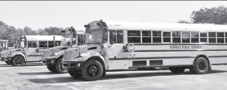 Safety Urged as Buses Begin to Roll Again