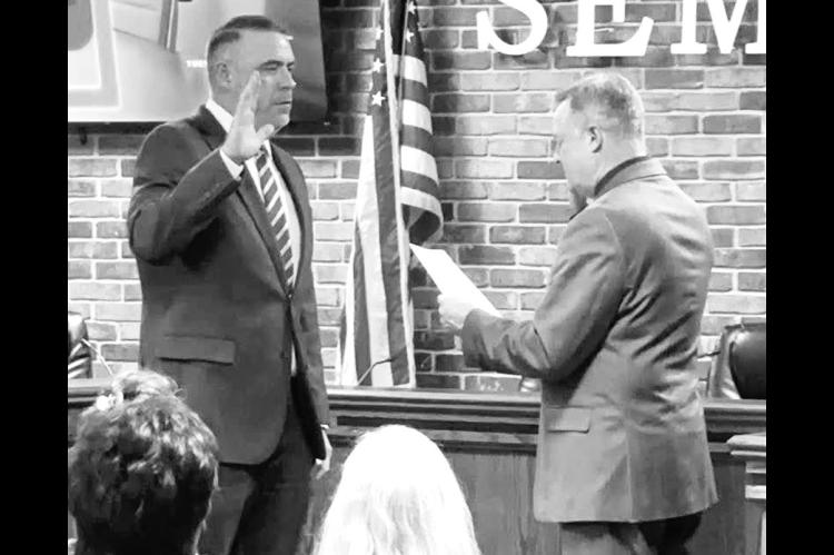 Above, Cory Crabtree was sworn into office as Mayor of Seminole by City Attorney Brad Carter at Tuesday’s city council meeting. Also sworn in were returning councilors Dana Miller (Ward 1) and Chris Anson (Ward 4), newly elected Ward 2 Councilor Jolene 