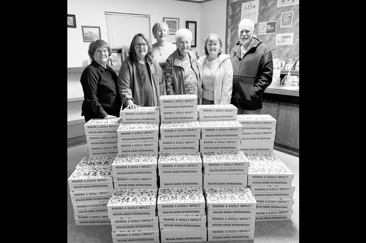 Members of the Church of Christ at Little with the “Magi Boxes” they have assembled that will be shipped across the world. Pictured l-r: Sandy Birdwell, Mary Boydstun, Teresa Ashcraft, Joyce Boggs, Debbie Ernst and Larry Ernst. (Courtesy photo)