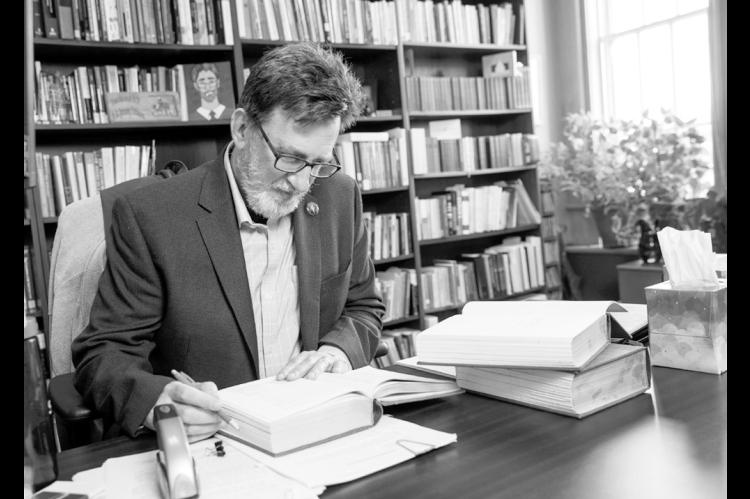 Jerry Telmen, a contracts professor at Oklahoma City University School of Law, is shown in his office on July 7, 2026. (Brent Fuchs/Oklahoma Watch)