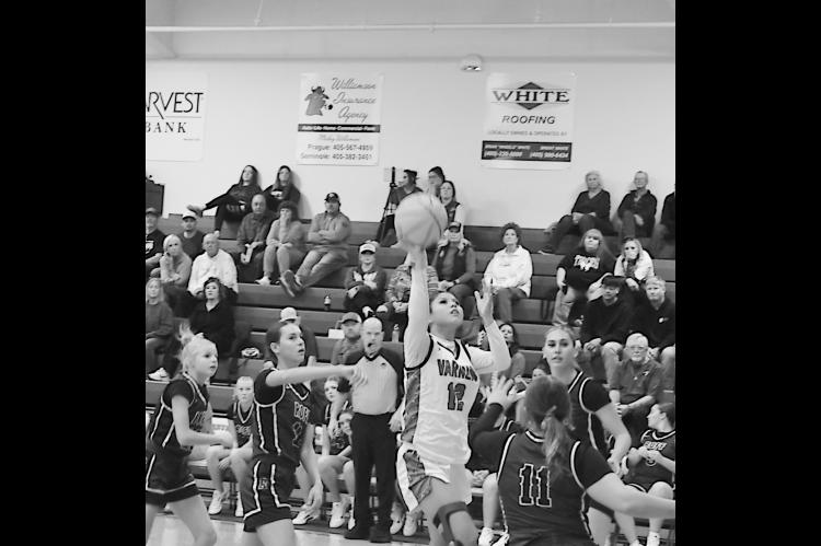 Varnum Lady Whippet Alyviah Lena goes up for the basket Tuesday night. Staff Photo by Andy Wilson