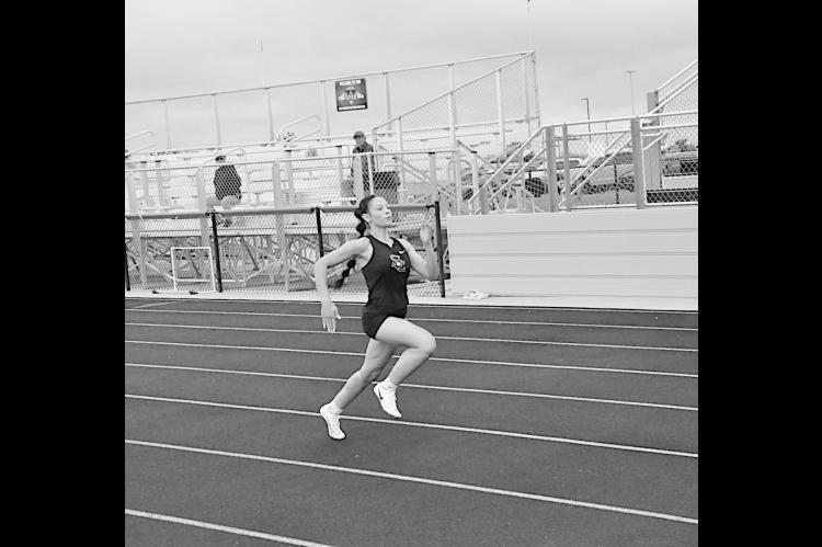 Seminole Lady Chieftain Maddison Harvey leads the pack in the 100 M Thursday. Staff Photo by Bill Anderson