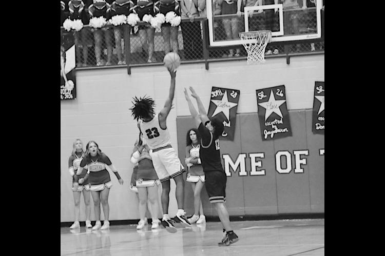 Seminole Chieftain Jay Ladd makes a crucial basket Friday night. Staff Photo by Bill Anderson