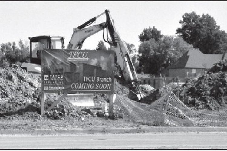 The landscape along Wrangler Blvd. near the East Gate housing addition is undergoing change, as a Tinker Federal Credit Union ( TFCU) is building a new branch office. TFCU, which has over 30 locations throughout Oklahoma and Texas, is currently located at
