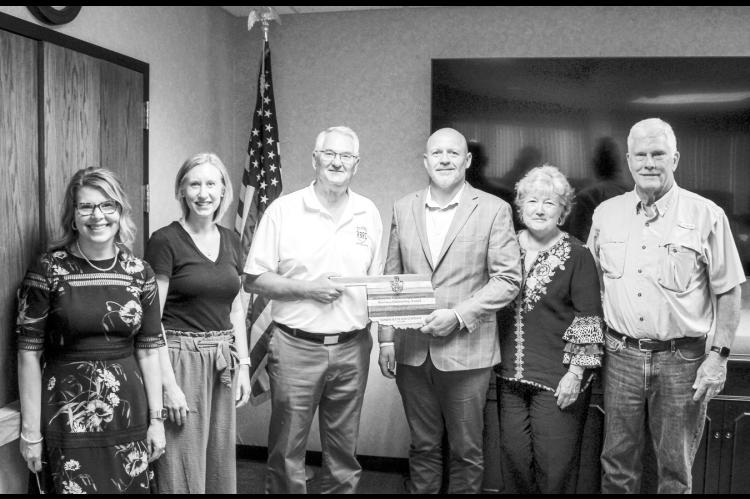 Seminole State College recognized Canadian Valley Electric Cooperative on June 8 for its statewide Regents Business Partnership Excellence Award. Pictured, from left, are Carla Tollett, CVEC Director of Communications and Member Engagement; Kim Pringle, SSC Director of Community Relations; Danny Morgan, SSC Rural Business and Resources Center Director; Josh Hold, CVEC CEO; SSC President Lana Reynolds; and Joe Semtner, CVEC Board President and District 6 Trustee. (Courtesy photo)