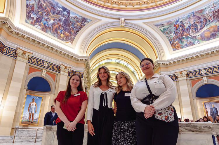 Seminole State College students Hannah Upchurch of Seminole, Felicity Hamilton of McLoud, Elizabeth Jackson of Chandler and Sylvia Thomas of Davenport pose for a photo in the atrium of the State Capitol March 31. (Photo provided by SSC)