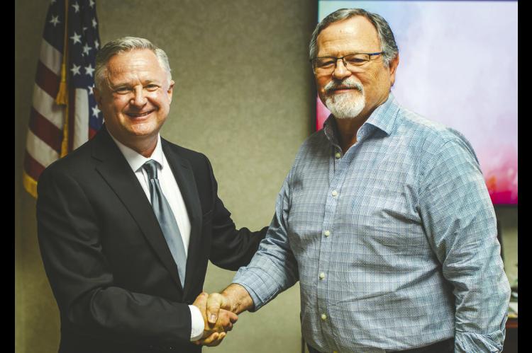 Seminole City Attorney and Oklahoma Army National Guard Brigadier General Brad Carter (left) congratulates new Seminole State College Regent David Hooten (right) following the administration of the oath of office during the SSC Board of Regents meeting on Aug. 20. Hooten’s seven-year term began July 1, 2026, and concludes July 1, 2033. (SSC photo)