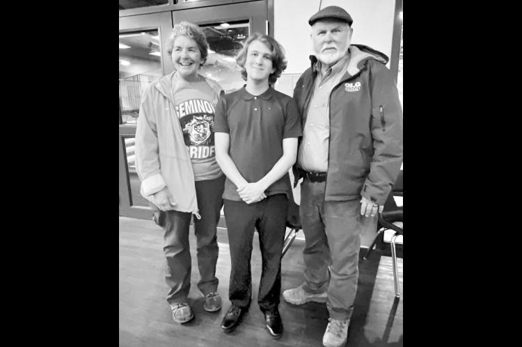 Ken and Karen Green stand with Seminole High School band member Jace Fitzgerald, the 2026 winner of the Kenny Green Memorial Scholarship. Jace has been in the Chieftain band for eight years, during which time his dedication as a percussionist has contributed to the band winning many accolades. (Courtesy photo)