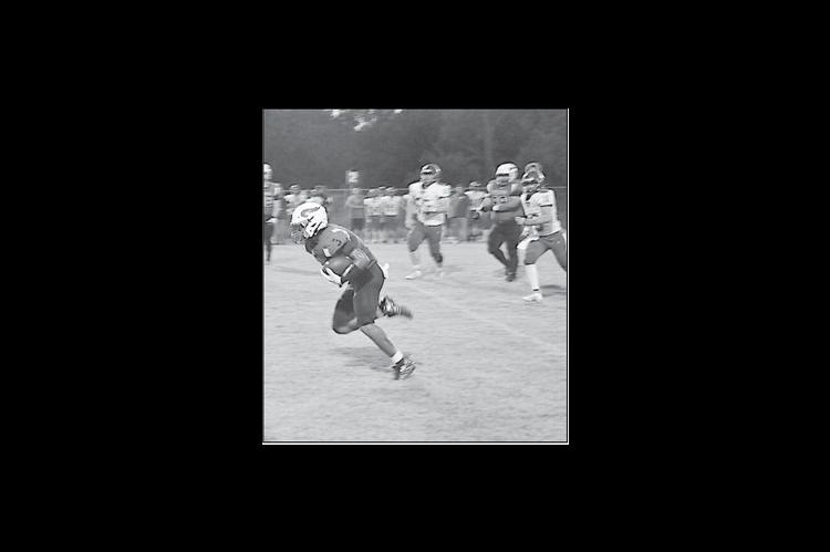 Sasakwa Viking Titus Collins breaks free for the rushing touchdown Friday night. Staff Photo by Bill Anderson