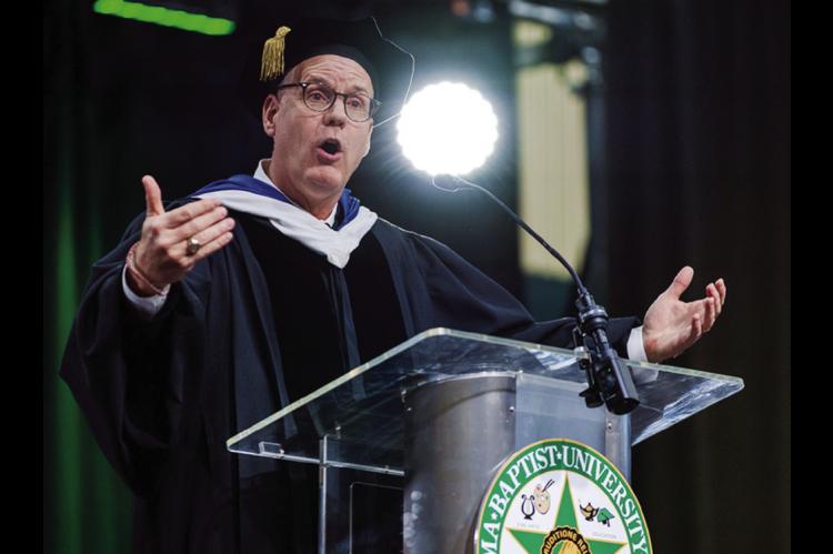 Dr. Chris Wall delivers the Oklahoma Baptist University Spring Commencement address on Saturday, May 9, in the OBU Recreation and Wellness Center. Saturday’s Commencement ceremonies marked the return of spring commencement to the OBU campus after events were held off campus in recent years due to damage to Raley Chapel caused by the April 19, 2023, EF2 tornado. (OBU photo)