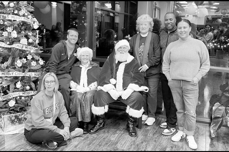 Seminole State College hosted its annual Night at the Lights event on Dec. 2 at the Reynolds Wellness Center. Left, several of the SSC athletics staff assisted with the event. Pictured l-r: Women’s Basketball Head Coach Rita Story-Schell, Women’s Socc
