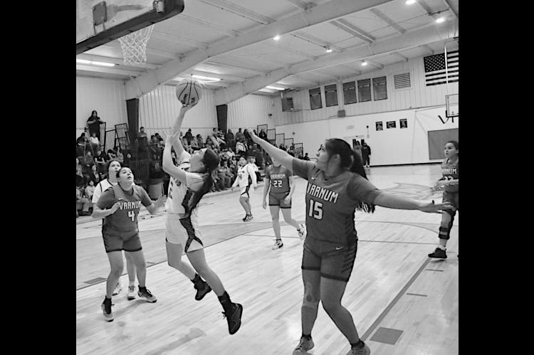 Sasakwa Lady Viking KK Wheeler cuts through the middle for the basket Tuesday night. Staff Photo by Bill Anderson