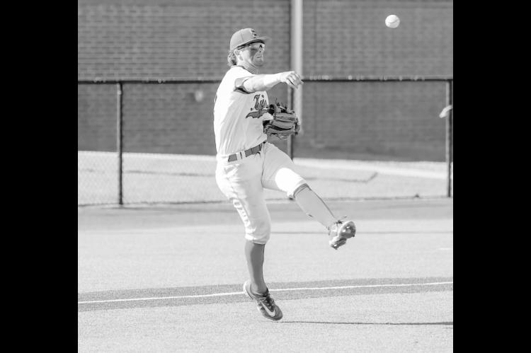 Seminole State’s Hutch Russell fields a slow ball and throws the batter out at 1st base. Courtesy Photo by Glen Bryan