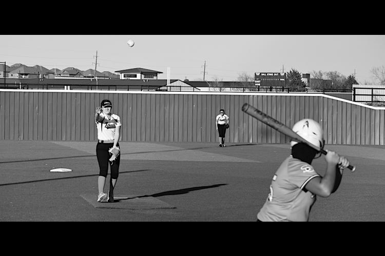 Konawa Lady Tiger pitcher Kadie Jencik throws the pitch to the waiting Seminole batter. Staff Photo by Andy Wilson