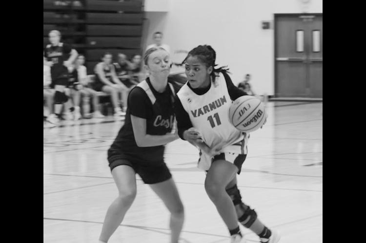 Varnum Lady Whippet Ayiana Brown fights off the Cashion defender Saturday. Courtesy Photo by Jeanne Gosa
