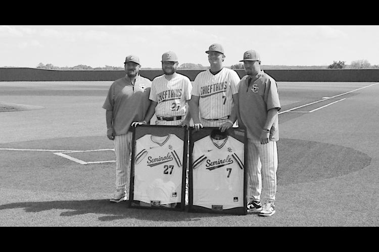 Seminole Chieftains honored two seniors before their ball game Thursday. Pictured is Alec Welch and Maverick Northrip. Staff Photo by Bill Anderson