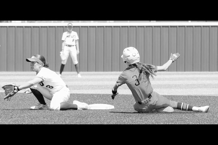 Seminole State Lady Trojan Ava Yocham reaches 2nd base ahead of the throw for a stolen base. Courtesy Photo by Glen Bryan