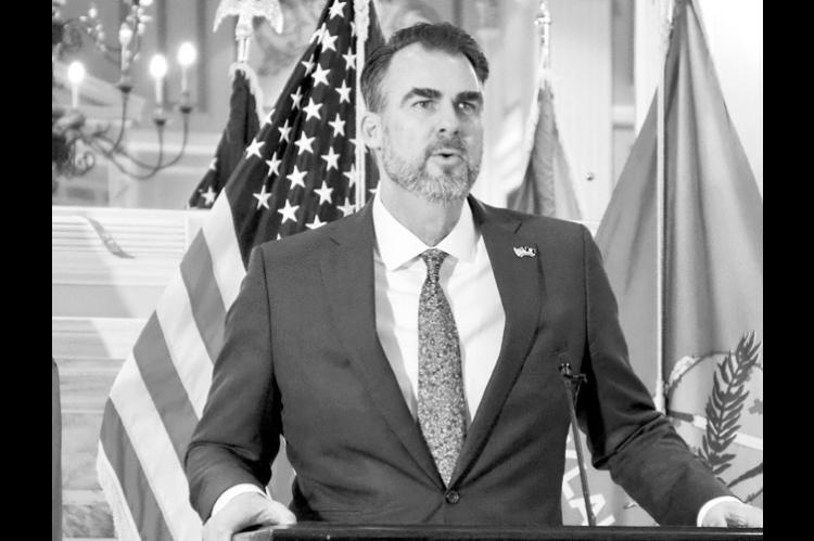 Gov. Kevin Stitt said he plans to push for cuts to Oklahomans’ personal income and corporate taxes. Stitt speaks to reporters at a news conference Jan. 29 in the state Capitol Blue Room in Oklahoma City. (Photo by Nuria Martinez-Keel/Oklahoma Voice)