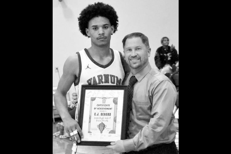 Varnum Whippet C.J. Bernard was honored this week for reaching a milestone of 1,000 points in his high school career by Head Basketball Coach Jon Hadley. Bernard reached the 1,000-point mark Dec. 17 in Lexington, Oklahoma. He was recognized before the sta