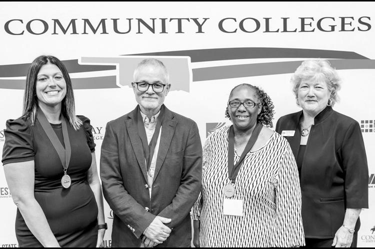Seminole State College employees were recognized at the 59th annual Oklahoma Association of Community Colleges Conference on Oct. 2 at Tulsa Community College. Pictured following the awards presentation, from left, are Professional Staff Member of the Year Erin Medley, Faculty Member of the Year Dr. Steve Bolin, Support Staff Member of the Year Carmen Wright and SSC President Lana Reynolds. (Photo provided)