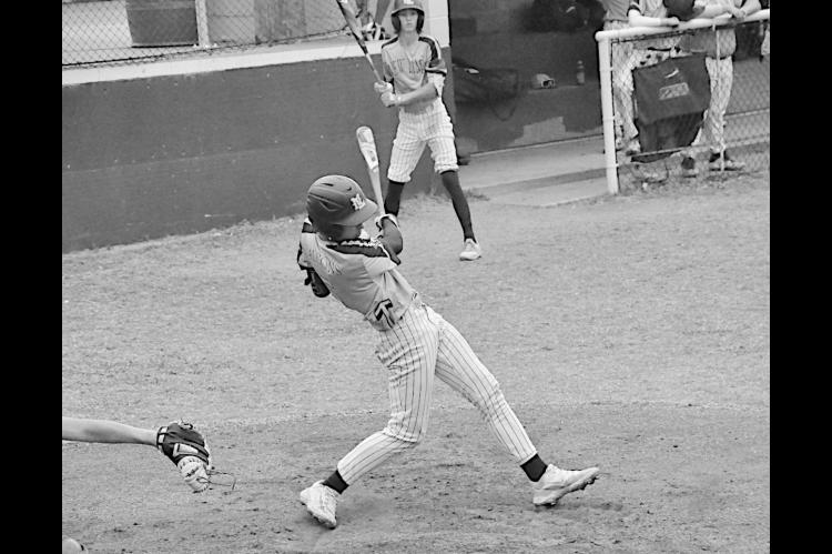 New Lima Falcon Logan Heard drives a ground ball to get on base. Staff Photo by Bill Anderson