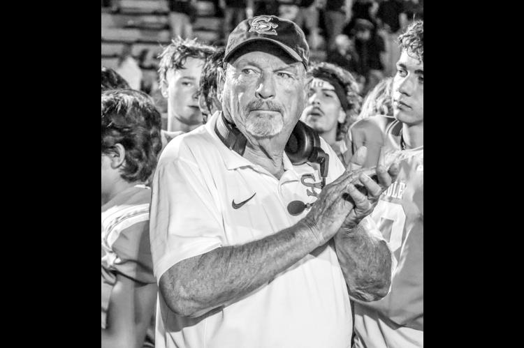 Seminole Head Coach Mike Snyder clapping along to green and white after Friday night’s win over Lone Grove. (Photo by Ben Schatzel)