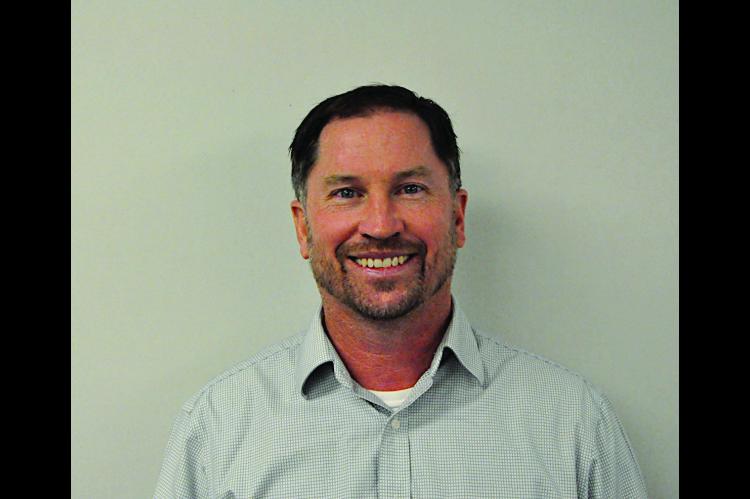 Coach Jon M. Hadley