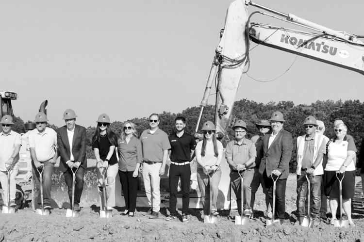Above, representatives from the City of Seminole, HeyDay Entertainment, the Seminole Lions Club, the Seminole Youth Council and other organizations gathered Tuesday morning to break ground on the future “Hey Seminole” Entertainment Center. Officials s