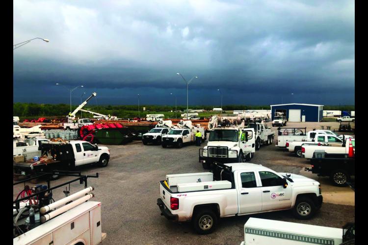 CVEC trucks ready to roll as a storm looms on the horizon. (CVEC photo)