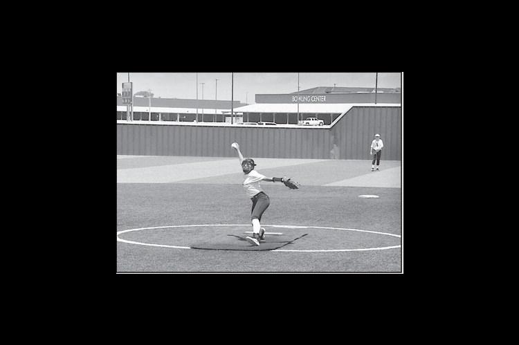 Varnum Lady Whippet Cori Vigil pitches to the waiting Piedmont batter Monday afternoon. Staff Photo by Bill Anderson