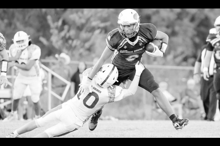 A Bowlegs defender tries to bring down Sasakwa Viking Sherman Mitchell Jr. Friday night. Courtesy Photo by Glen Bryan