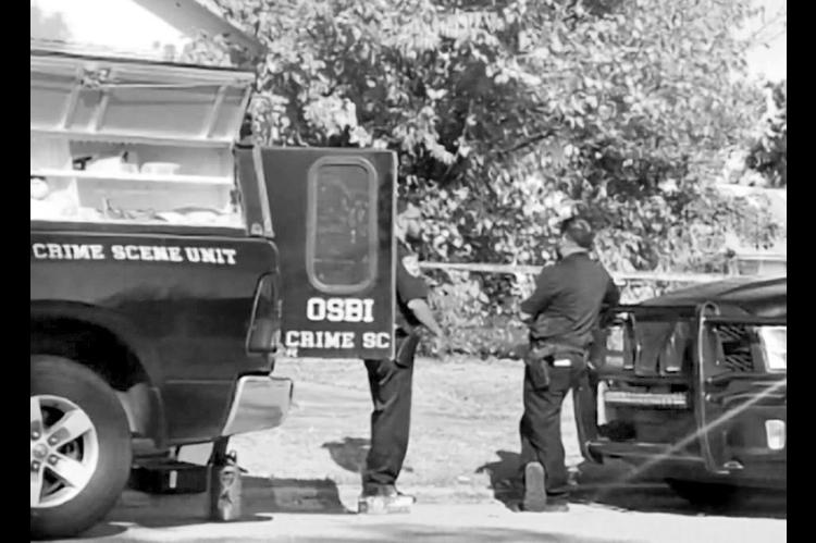 Crime Scene The Oklahoma State Bureau of Investigation was called in to help investigate a homicide after 50-year-old Tony Walters was found dead in a residence on Jefferson early Saturday morning. Augustus Hull, 23, has been charged with first-degree murder. —Photo by Zane Feken